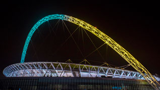 The Wembley arch lights up London