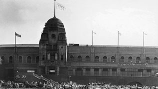 The 1948 London Olympic Flag flies above the old Wembley Stadium