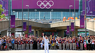 Gordon Banks with the Olympic Torch at Wembley Stadium