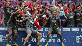 Rotherham celebrate promotion back to the Championship