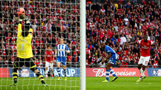 Scott Carson denies Yaya Sanogo at Wembley