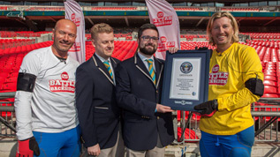 Robbie Savage with his Guinness World Record certificate