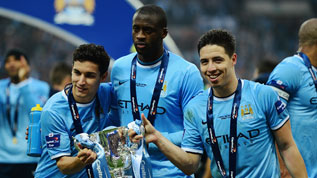 Manchester City celebrate winning the Capital One Cup