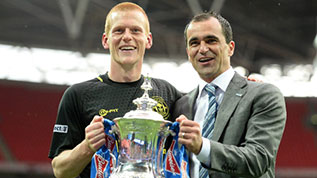 Ben Watson and Roberto Martinez celebrate winning the 2013 FA Cup