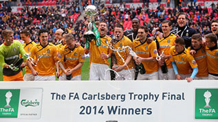 Cambridge lift the FA Carlsberg Trophy at Wembley