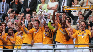 Cambridge celebrate winning the Conference Promotion Final