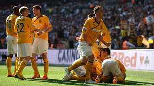 Cambridge celebrate Ryan Donaldson's goal at Wembley