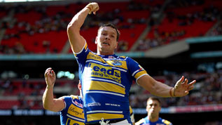 Danny McGuire celebrates his try for Leeds