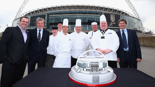 England manager Roy Hodgson takes to Wembley Way to cut Wembley's 90th birthday cake