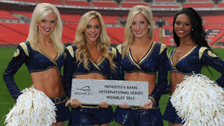 The St Louis Rams cheerleaders with their Wembley Way stone